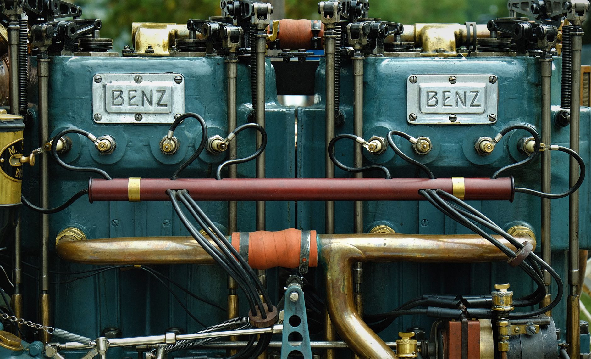 Intricate vintage Benz engine parts with industrial design in focus.